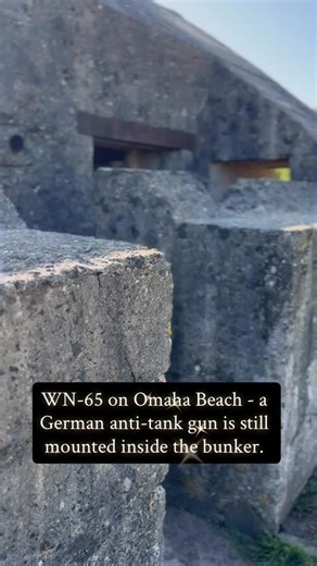WN-65 on Omaha Beach - a German anti-tank gun is still mounted inside the bunker. #ww2history #ww2 #omahabeach #dday #normandy | Walk Among Heroes