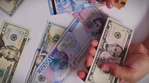 Download Male Hands Counting a Stack of 100 Dollar Bills on Blurred Money Background. Stack of banknotes in 10000 american dollars currency strap for hundreds. Investments in cryptocurrency. Capital. Wealth. for free