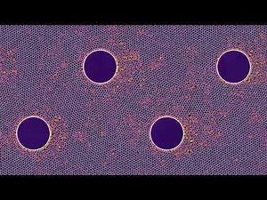 Phonons in a flowing granular material