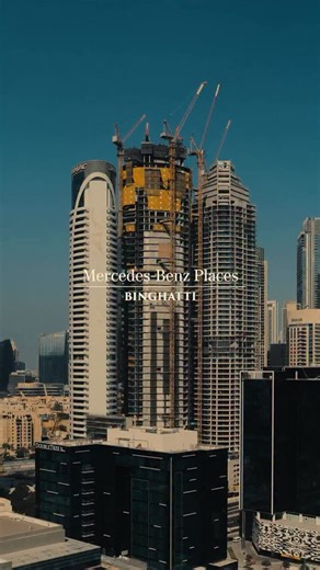 Mercedes-Benz Places by Binghatti continues to rise over Downtown Dubai, now reaching 52 floors and over 220 metres in height. With 52 of 70 floors completed, the tower is rapidly taking shape, while the installation of the iconic 50-metre steel crown elevates the structure to an impressive 341 metres from ground level, marking a key milestone in its journey. | Binghatti
