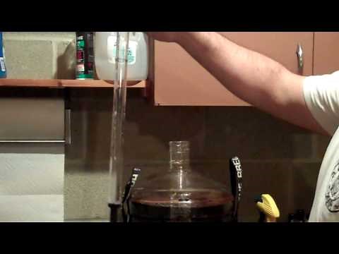 Taking a beer sample using a wine thief and hydrometer