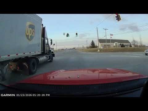 Dashcam footage of a redlight runner crashing into me in my truck.