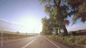 POV point of view - Driving on rural roads in farmland on Midwest