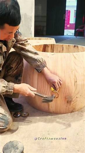 Finishing Touches: Installing Decorative Hardware on Hand-Carved Wooden Barrels