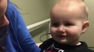 Watch moment baby hears parents for first time