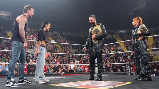Seth Rollins attacks AJ Lee; CM Punk stomps him into oblivion