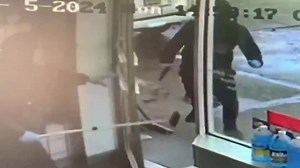 Gas station attendant fights off armed suspect with a squeegee
