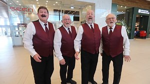 Barbershop quartet warming hearts with Valentine melodies