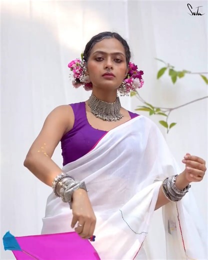 Suta | Sarees & Blouses on Instagram: "White saree with multicolour kite appliqué, pink crochet lace, and contrasting pink tassels Playful, bright, and full of sky-bound dreams, this saree celebrates the joy of Basant through hand-appliqued kites in a burst of colours. The soft drape feels effortless, while the crochet lace and tassels add a sweet festive charm, like patangs dancing in a spring breeze. A lift of joy. A flight of Basant. Comment “Basant” for link (Suta Bombay, Suta Saree, Basant 