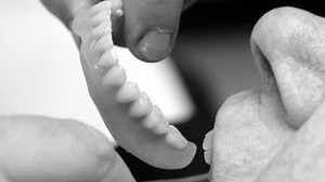 Woman Says False Teeth Stolen While She was Sleeping