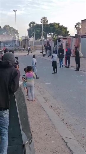 73K views · 345 reactions | *Manenberg stone throwing* Heavy stone throwing in Swakop rd. Services notified | Cape Town Gang violence updates | Facebook
