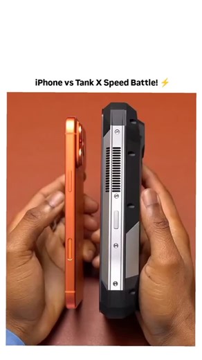 CROSSERA CLIPS on Instagram: "This viral tech showdown video, posted by MentalidadFeroz with the caption "Prueba de velocidad entre el iPhone 17 Pro Max y el Tank X," pits Apple's sleek, premium iPhone 17 Pro Max against the rugged, ultra-durable Tank X (a massive, indestructible "brick phone" built for extreme conditions). Side-by-side, they race through app opening, scrolling, gaming, or benchmark tests—the slim iPhone edges out slightly in raw speed, but the bulky Tank X holds its own impress