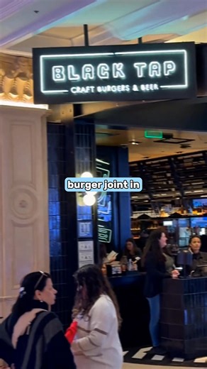 I haven't seen anybody talking about this. Please tell me I'm not the only one that gets absolutely mind-blown by the ridiculous milkshake towers they're serving up at Black Tap Vegas. These aren't just milkshakes, they're architectural marvels topped with entire slices of cake. You walk into this high-end burger joint at The Venetian, where people are dropping nearly thirty bucks on Wagyu Steakhouse burgers. But the real stars of the show are these insane CrazyShakes that look like Vegas decide