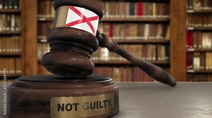 Alabama Flag on Judge Gavel or Hammer in Court with Text Not Guilty. Verdict, Law Concept