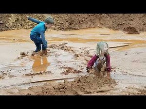 Kids playing in the mud