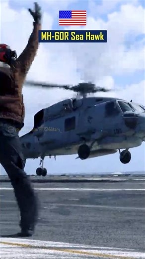 Watch Navy Sailors Prepare an MH-60R Sea Hawk on a Moving Aircraft Carrier