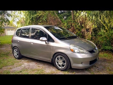 Honda Fit rear camber alignment with washers.