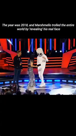 SoNG | HiP-HoP | MuSiC on Instagram: "This video captures a special moment featuring the electronic music producer and DJ Marshmello, widely known to be Christopher Comstock. Marshmello is famous for wearing a custom, large white helmet designed like a marshmallow, which is reported to cost approximately $55,000 and includes built-in air conditioning. While Marshmello often maintains anonymity, his identity was confirmed by Forbes in 2017. He has held performances in various international locati