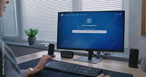 Adult woman types prompt in artificial intelligence chatbot on PC. Advanced AI image generator generate detailed high-quality photo portrait of sci-fi robot. AI generated image creation technology.