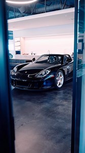 13K views · 221 reactions | 2005 Porsche Carrera GT This stunning black-on-black example boasts the legendary 5.7L V10 engine, producing 605 horsepower and a raw, naturally aspirated soundtrack that thrills every driving enthusiast. Porsche produced a total of 1,270 Carrera GTs, and of those, approximately 232 were finished in Black (Basalt Black or standard Black) from the factory - Learn more: https://bit.ly/4hY5oyy | duPont REGISTRY | Facebook