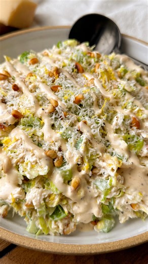 Maddie Ireland on Instagram: "new year, same obsession with chicken salad 🤭 and if you aren’t a chicken salad lover yet, this recipe is about to convert you my caesar chicken salad is like everything you love about a caesar salad, but in a creamy meal-preppable format 🙌 shredded chicken, shaved brussels, toasted pine nuts and parm all tossed in the BEST caesar dressing from @primalkitchenfoods 🍋🧄 #ad you can find Primal Kitchen dressings nationwide at your local grocery store (I pick mine up