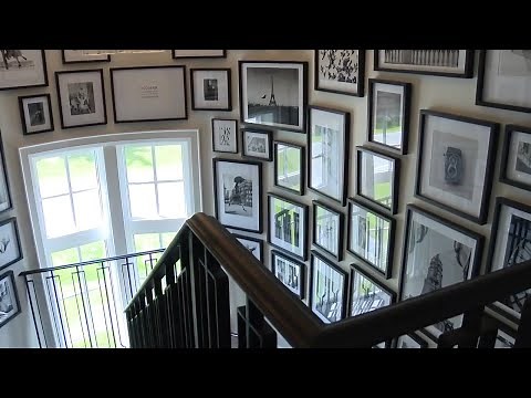 An expert's guide to hanging artwork on your staircase wall