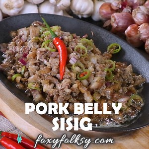 Sisig is probably the most famous Kapampangan dish ever! Get this easy and authentic Sisig recipe using grilled pork belly! Crunchy and spicy just the way it should be. | Foxy Folksy - Modern Filipino Kitchen