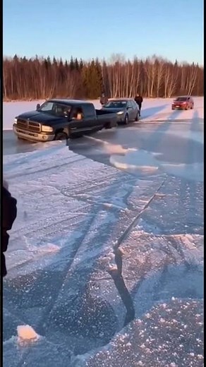 Pickup Truck Falls Through Ice on Frozen Lake