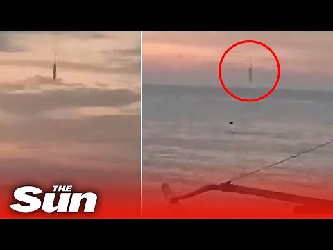 Mystery as anchor-shaped UFO leaves trail of smoke before crashing into sea