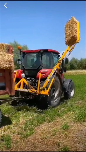 CASE Tractor Loading Hay Bales Into Trailer #usatractor #farming #casetractor