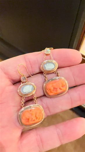 Carved cameos enjoyed immense popularity as earrings in 19th-century jewelry, particularly during the Victorian era when portable portraiture, symbolism, and historical revivalism were highly prized. Cameos—raised relief carvings, often depicting classical, mythological, or romanticized subjects—were traditionally crafted from hardstones like agate or carnelian, but in the early 19th century, artisans began favoring shells due to their softness and ease of carving, helping democratize cameo jewe