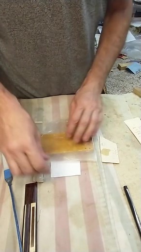 My favorite way to shim a bone nut. Typing paper and CA glue. #luthier #guitar #guitartok | Jessica.violins