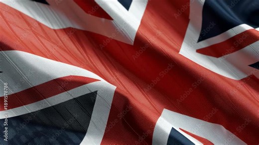 Union jack flag waving with visible fabric texture and intricate details, symbolizing british patriotism, national identity, and the rich heritage of the united kingdom