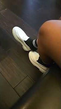 She takes her shoes off