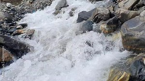 water flowing over rocks , Water video flowing in mountain , fresh water flowing video full HD