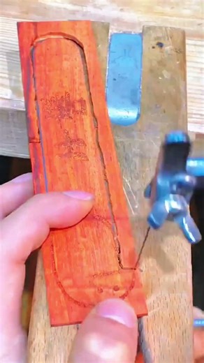 Saw blade guided steady cutting cartoon outline into wood