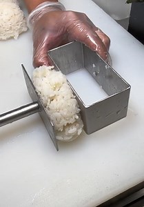 Are you familiar with Chicken Musubi, the delightful fusion of juicy chicken and savory rice wrapped in a crisp seaweed sheet? This snack, a twist on the traditional Japanese musubi, combines tender, marinated chicken with perfectly cooked rice, creating a flavorful and satisfying bite. 😋 📽 Aloha Kitchen and Bar #streetfood #geekyfork | Taste Lab