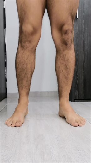 Close-Up Footage of Adult Male Legs Indoors