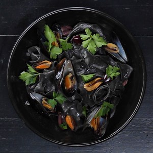 240K views · 288 reactions | Take dinner time deep down under the sea with these ink-hued dishes!  Recipes: https://tasty.co/recipe/squid-ink-calamari https://tasty.co/recipe/squid-ink-fettuccine-with-black-mussels https://tasty.co/recipe/no-bake-charcoal-cheesecake | Tasty UK | Facebook