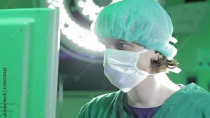 Doctor operating anaesthesia machine