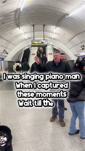 A busker singing from the heart, people stopping, smiling, dancing, forgetting the rush for a moment. This is why I love this city — strangers connected by music, even if just for one song. #busker #streetmusic #undergroundvibes #londonlife #musicinthecity