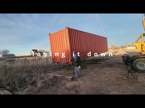 Moving a 40 foot container with a crane