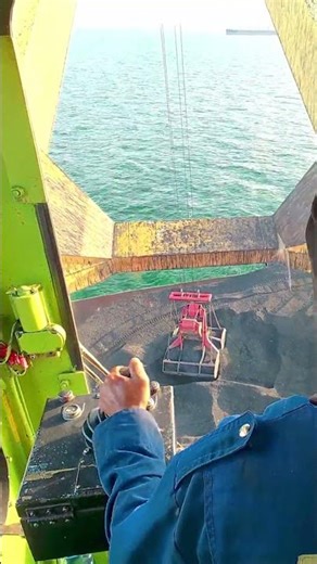 POV Witness the incredible precision of a professional crane operator loading coal. 🏗️⚓#shorts