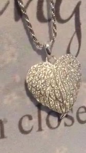 Here is a short video of the 'Wings of Love' pendant. See how it sparkles when it catches the light! A real statement piece! | Angels Meadow