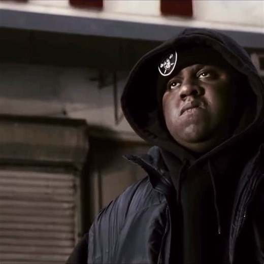 @rememberjpeg on Instagram: "Notorious (2009) 🎤🎙️ Tells the story of Christopher Wallace, better known as The Notorious B.I.G. The film follows his journey from the streets of Brooklyn to becoming one of the most influential figures in hip-hop. It shows the grind, the ambition, and the life lessons behind his rise, capturing the energy and struggles that shaped him. The fashion in the movie is pure 90s hip-hop history. Baggy jeans, Timberlands, Coogi sweaters, and gold chains paint a picture o