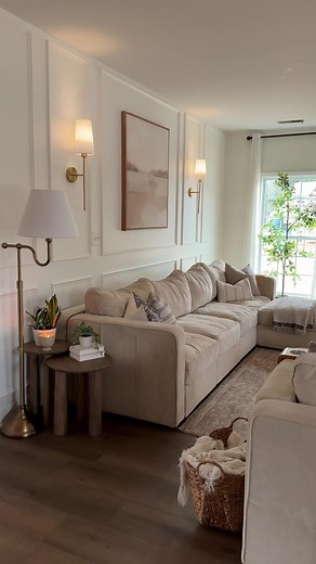 POV: You ask your husband to give this wall a makeover! 🥹😍 This was such a simple project but made such a massive difference! Adding moulding trim to this wall made such a big difference to the feel of this room! The walls feel taller, the room feels more custom, and everything seems so much brighter and clean! It added such a nice elegant touch! Now I wanna do more walls in the house!🤣🤣 I also added the gold pendant lamps to the wall to give it a cozy touch and the large painting in the mid
