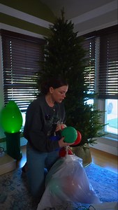 I found these jumbo Christmas glowing balls at the thrift store this year and HAD to try them out! What do you think?! #christmaslights #christmasdecor #christmasmagic #vintagechristmas #christmasdecorating #christmastree #christmastreedecorating | The Holiday Classics