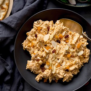 Cooked cold chicken in a creamy, spicy sauce with sultanas and apricots, this Coronation chicken is a British classic! It makes a fantastic sandwich filler, jacket potato topper or serve with a lovely crisp salad.😋 #nationalpicnicweek #kitchensanctuary https://www.kitchensanctuary.com/coronation-chicken/ | Kitchen Sanctuary