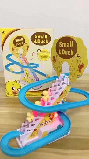 Colorful Duck-Themed Toy Train Set on Blue Track