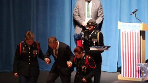 Matt Simmons, who taught at Wiregrass Ranch High School for 13 years and is a veteran of the Army, was diagnosed with ALS this year. We paid tribute to him today at our Veterans Day ceremony. Thank you Sgt. Simmons for your dedication to our students and country. | Pasco County Schools